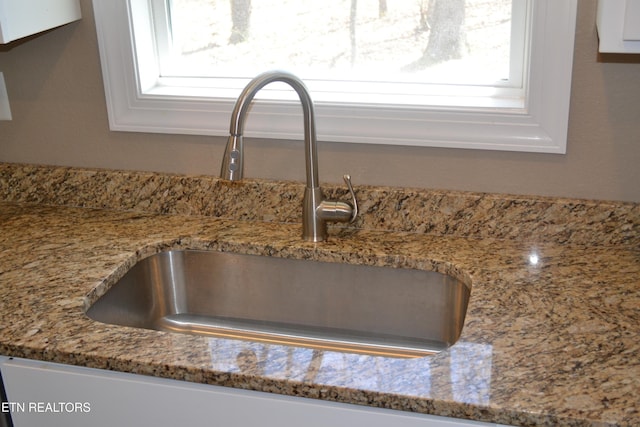 1382 Pilgrim Dr, Grimsley, TN 38565 - room details featuring a sink and light stone counters