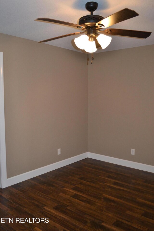 1382 Pilgrim Dr, Grimsley, TN 38565 - empty room featuring dark wood finished floors, baseboards, and ceiling fan