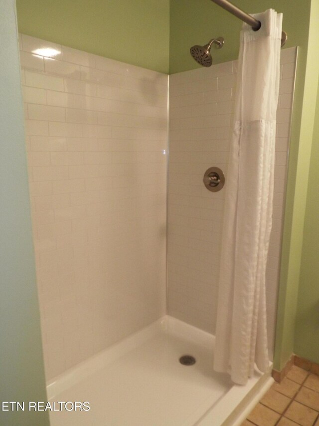 225 Collier Dr, Sevierville, TN 37862 - full bathroom with tile patterned floors and a stall shower