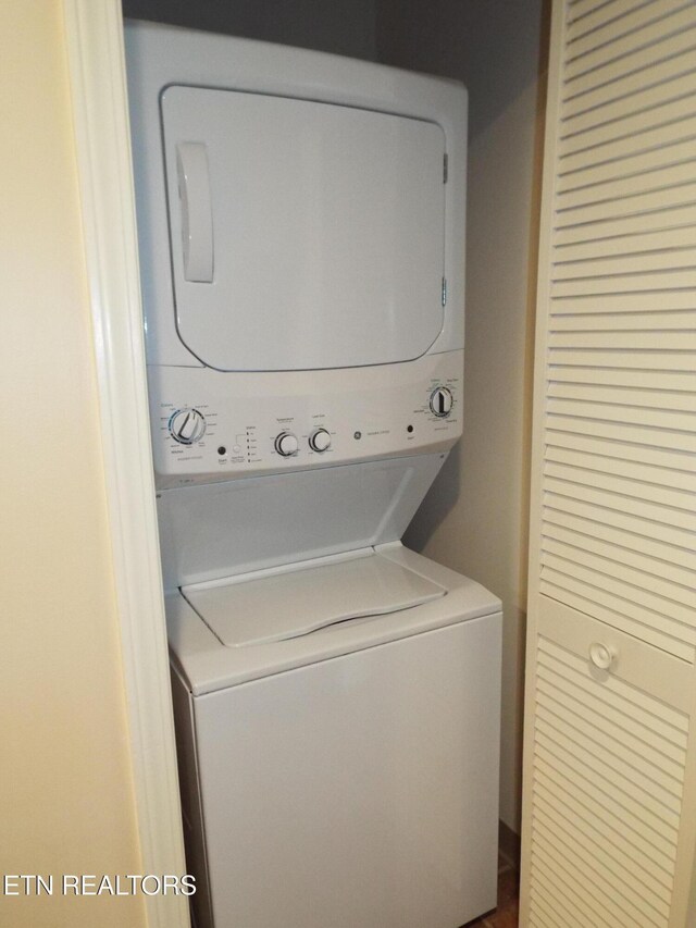 225 Collier Dr, Sevierville, TN 37862 - laundry room with stacked washer / dryer and laundry area
