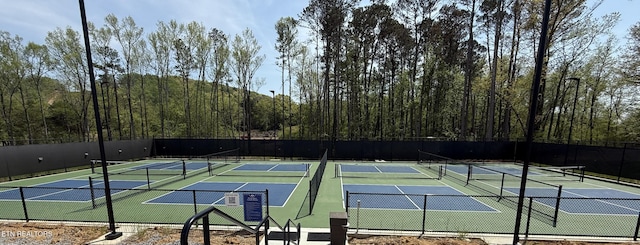 view of sport court featuring community basketball court and fence