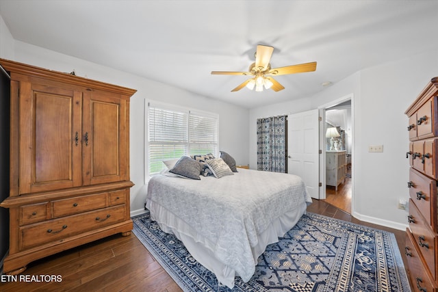 2143 Renegade Mountain Pkwy, Crab Orchard, TN 37723 - bedroom with ceiling fan, baseboards, and dark wood finished floors