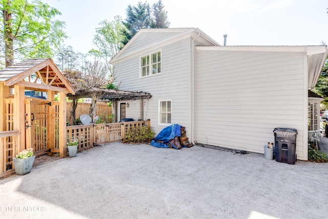 3835 SW Keowee Ave, Knoxville, TN 37919 - back of house featuring a patio, a pergola, and fence