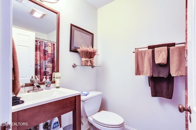 3835 SW Keowee Ave, Knoxville, TN 37919 - bathroom featuring vanity, visible vents, and toilet