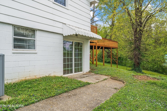 view of yard with a wooden deck