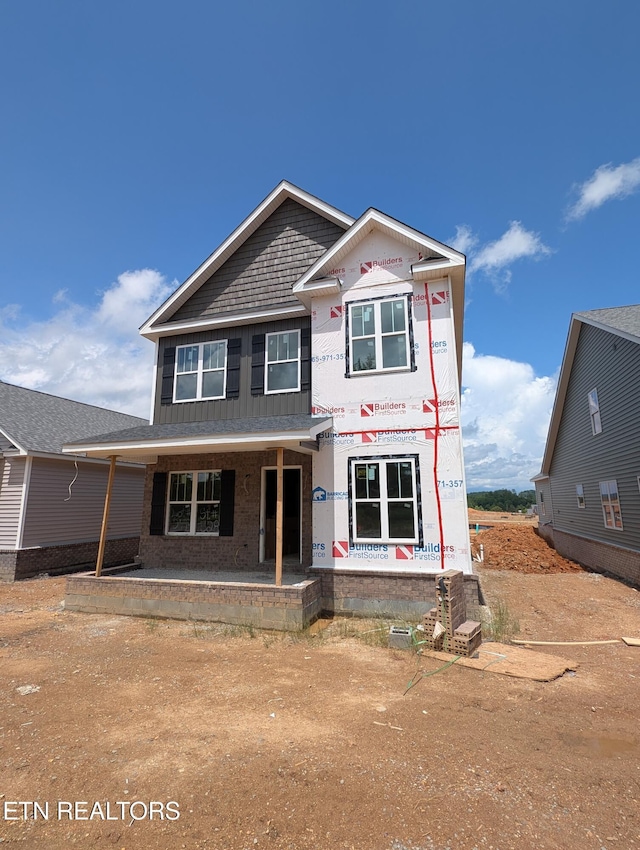 528 Broadberry Ave Lot 27B, Oak Ridge, TN 37830 - property under construction featuring a porch, board and batten siding, and brick siding