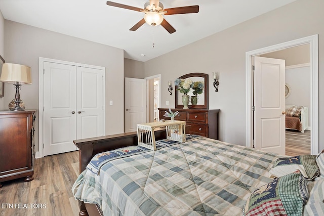 bedroom featuring a closet, ceiling fan, and wood finished floors