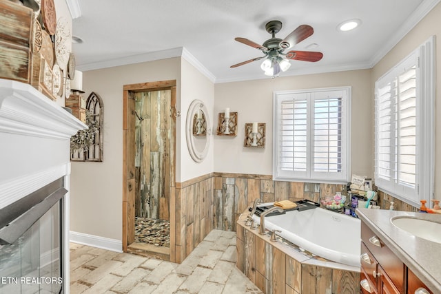 full bathroom featuring crown molding, a garden tub, ceiling fan, and tiled shower