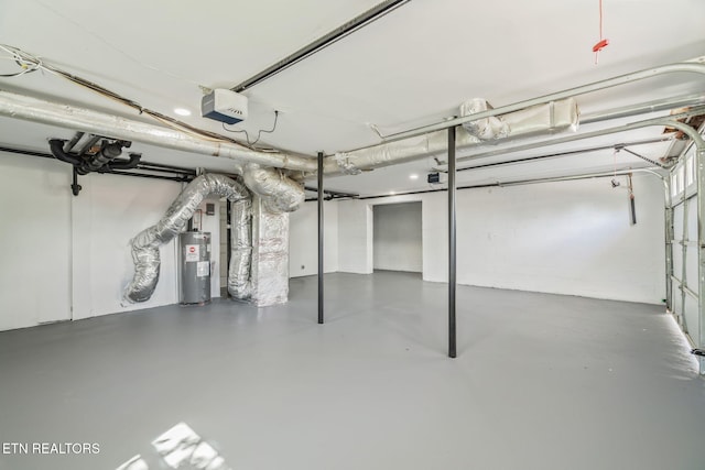 below grade area featuring electric water heater