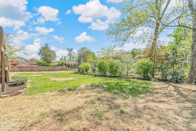 view of yard with fence