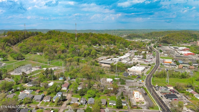 drone / aerial view featuring a view of trees
