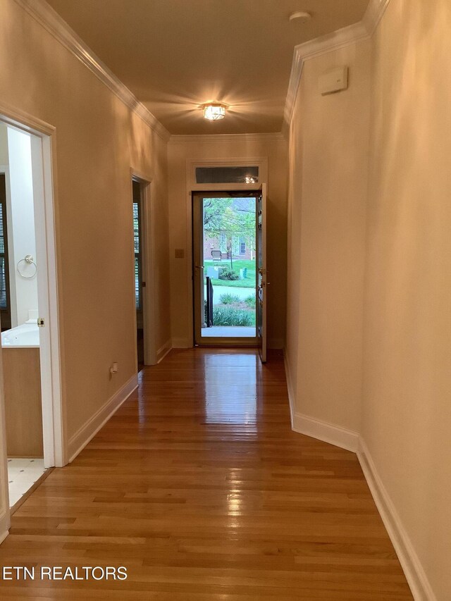 11608 San Martin Ln, Knoxville, TN 37934 - hallway with ornamental molding, light wood finished floors, and baseboards