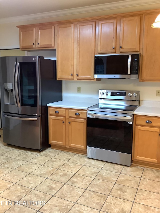 11608 San Martin Ln, Knoxville, TN 37934 - kitchen featuring stainless steel appliances, light countertops, ornamental molding, and light tile patterned flooring