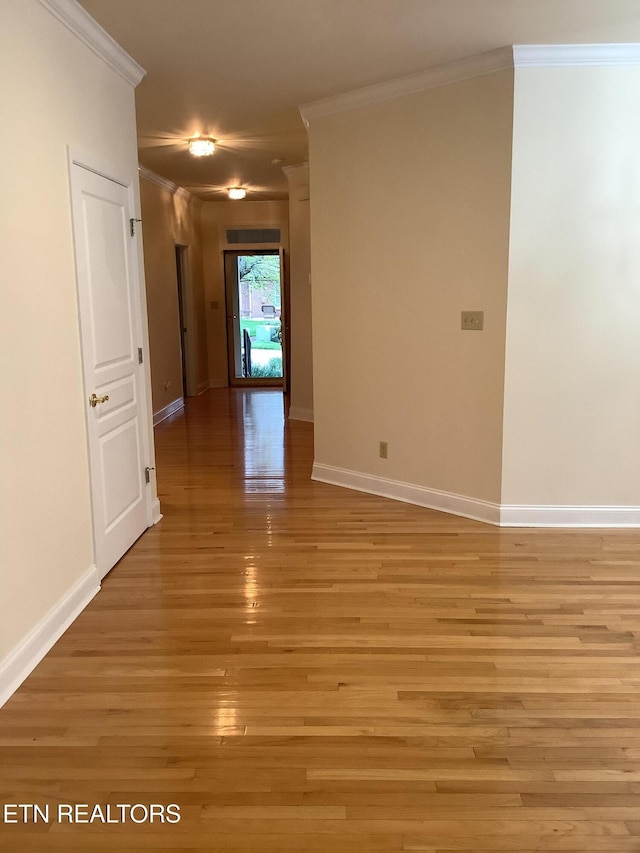 11608 San Martin Ln, Knoxville, TN 37934 - unfurnished room featuring crown molding, light wood-style floors, and baseboards