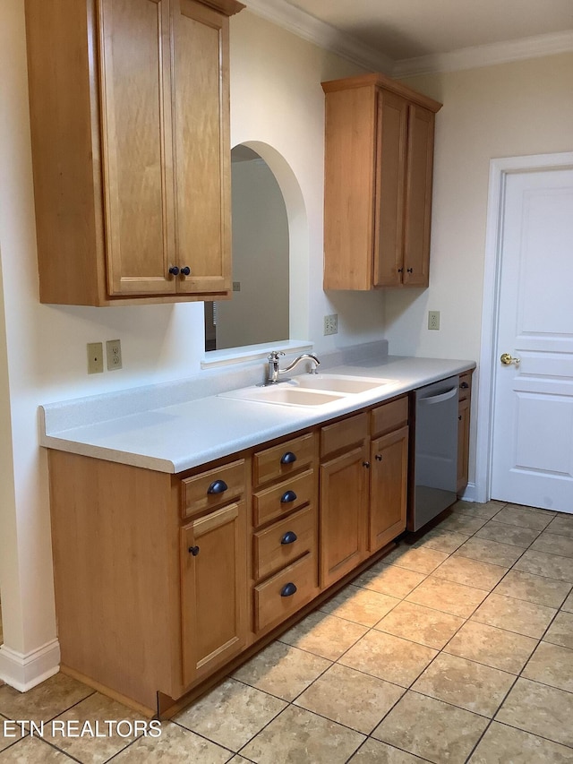 11608 San Martin Ln, Knoxville, TN 37934 - kitchen with dishwasher, a sink, light countertops, crown molding, and arched walkways