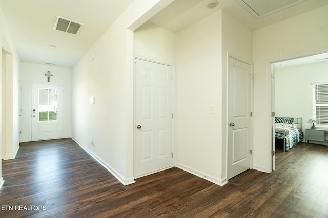 1133 Beacon Rd, Sevierville, TN 37876 - corridor featuring visible vents, baseboards, attic access, and dark wood-style floors