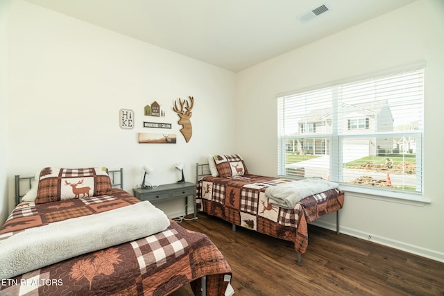1133 Beacon Rd, Sevierville, TN 37876 - bedroom featuring visible vents, baseboards, and wood finished floors