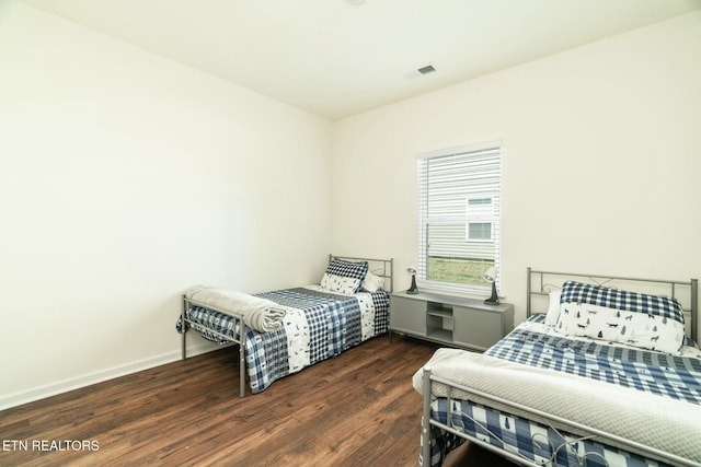 1133 Beacon Rd, Sevierville, TN 37876 - bedroom featuring visible vents, baseboards, and wood finished floors