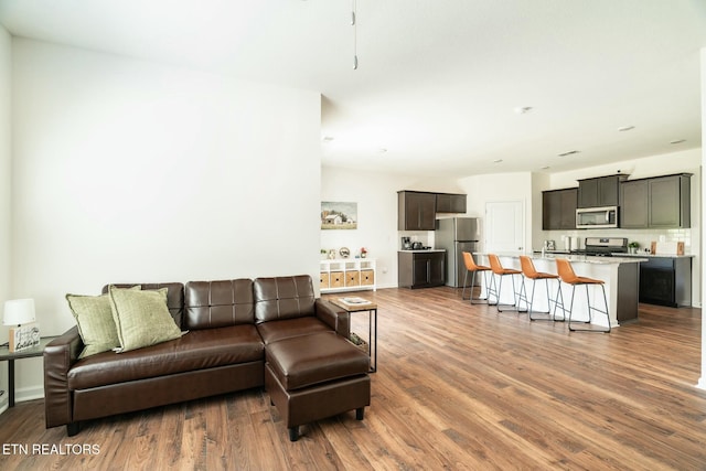 1133 Beacon Rd, Sevierville, TN 37876 - living area with wood finished floors