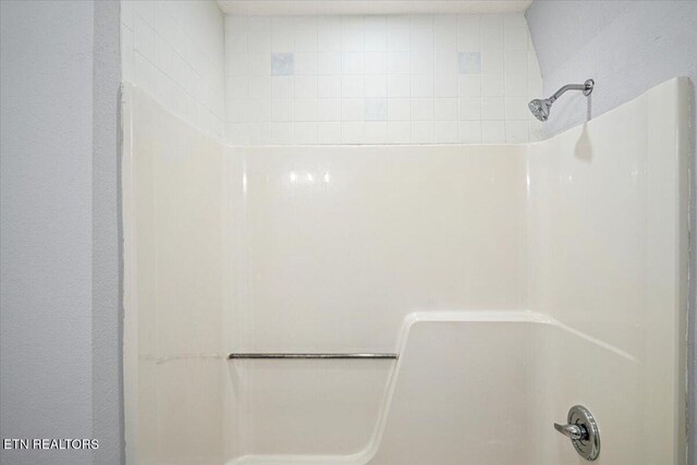 room details featuring walk in shower