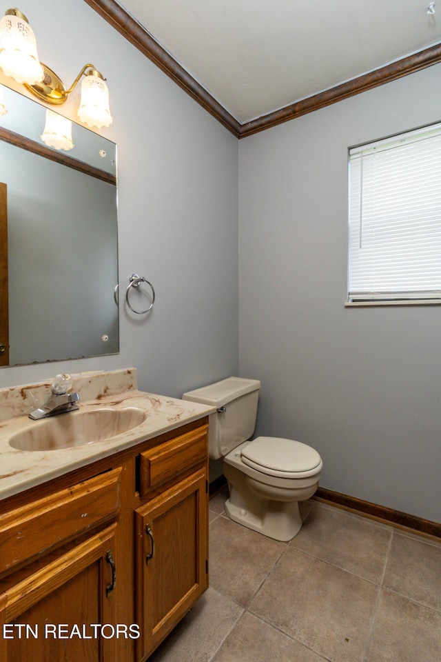 98 Hampshire Cir, Oak Ridge, TN 37830 - bathroom with tile patterned floors, toilet, baseboards, vanity, and ornamental molding