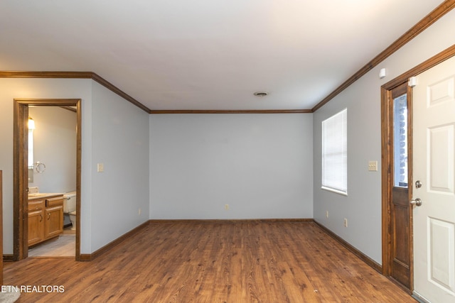 98 Hampshire Cir, Oak Ridge, TN 37830 - interior space with wood finished floors, visible vents, crown molding, and baseboards