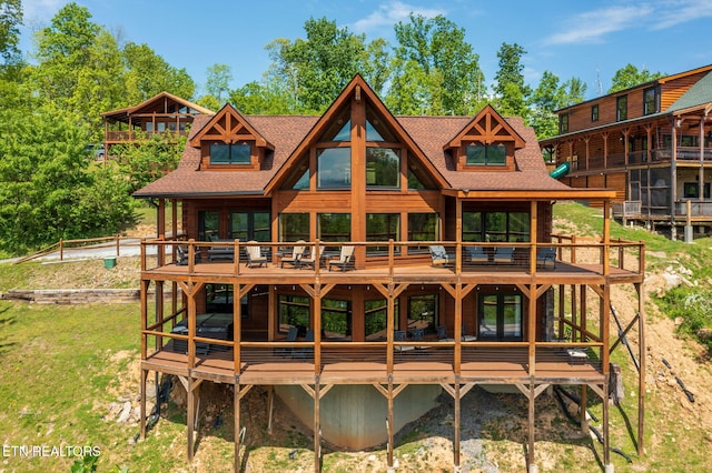 3505 Mountain Tyme Way, Sevierville, TN 37862 - rear view of property featuring roof with shingles, a wooden deck, and a lawn