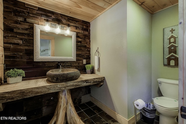3505 Mountain Tyme Way, Sevierville, TN 37862 - half bathroom with baseboards, a sink, toilet, and wood ceiling