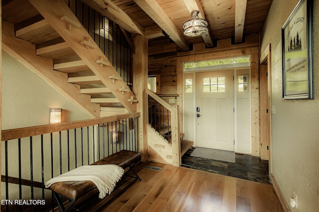 3505 Mountain Tyme Way, Sevierville, TN 37862 - entrance foyer featuring wood ceiling, wood finished floors, stairway, beamed ceiling, and a textured wall