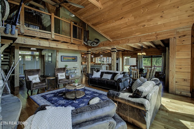 3505 Mountain Tyme Way, Sevierville, TN 37862 - living room featuring a wealth of natural light, wood-type flooring, ornate columns, and an inviting chandelier