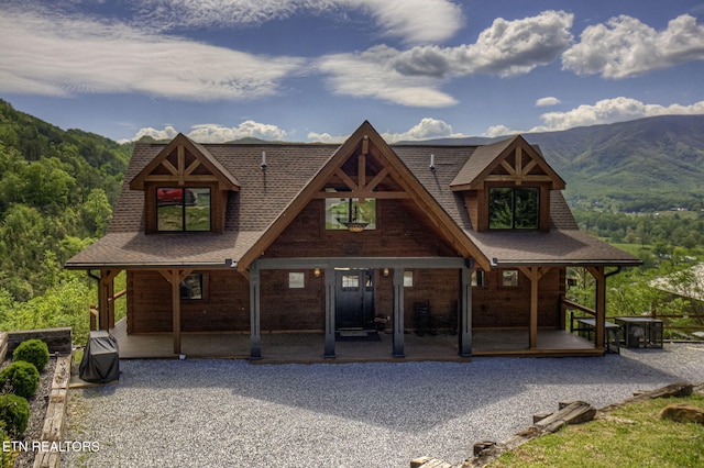 3505 Mountain Tyme Way, Sevierville, TN 37862 - view of front facade with a shingled roof, a mountain view, and a porch