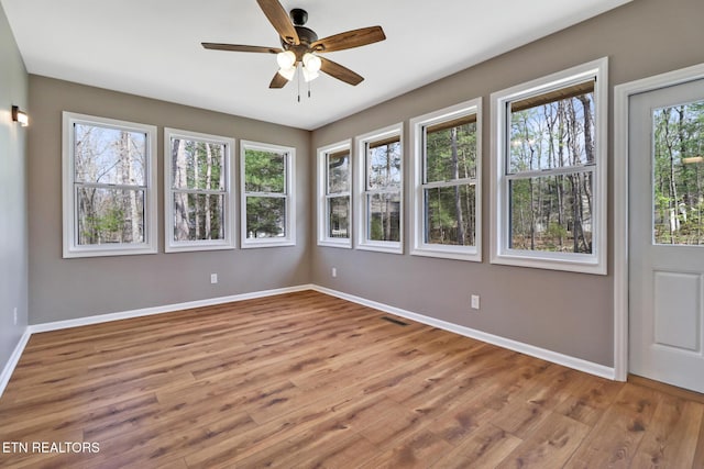 28 Overlook Ter, Crossville, TN 38558 - empty room with visible vents, baseboards, a ceiling fan, and wood finished floors