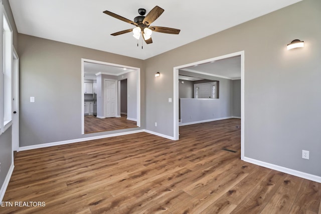28 Overlook Ter, Crossville, TN 38558 - unfurnished room with baseboards, a ceiling fan, and wood finished floors