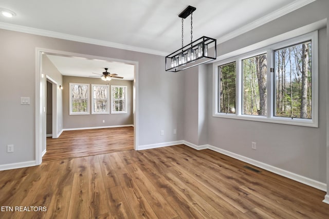 28 Overlook Ter, Crossville, TN 38558 - unfurnished dining area with crown molding, wood finished floors, baseboards, and visible vents