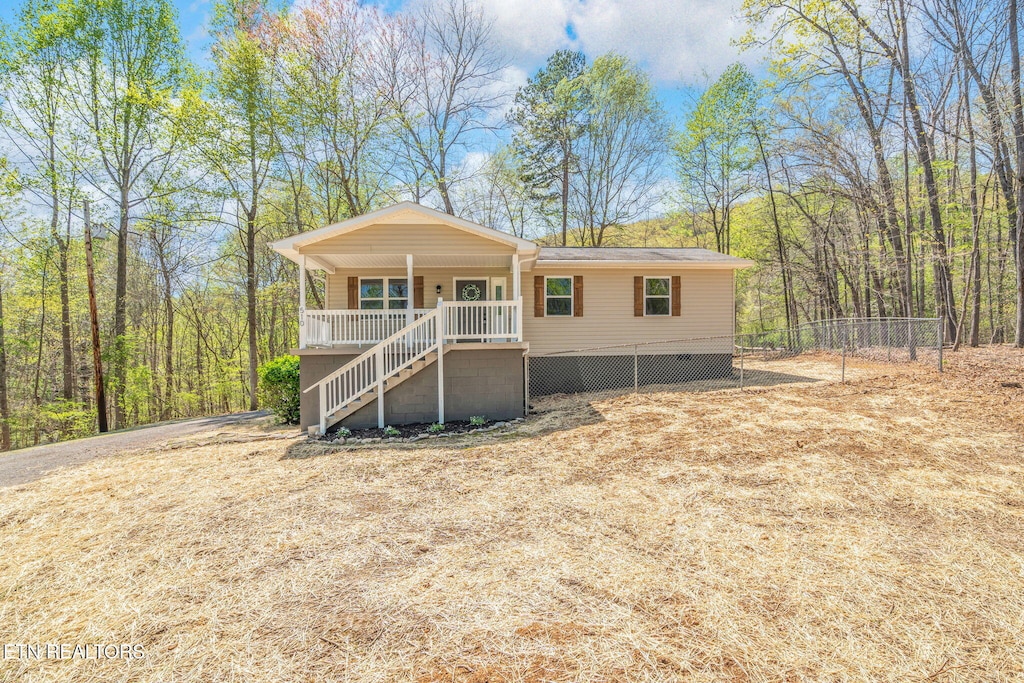 510 Sheldon Dr, Harriman, TN 37748 - manufactured / mobile home with stairway, a porch, and crawl space