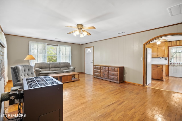 139 Hearon Rd, Kingston, TN 37763 - living room featuring light wood-type flooring, ceiling fan, crown molding, and visible vents
