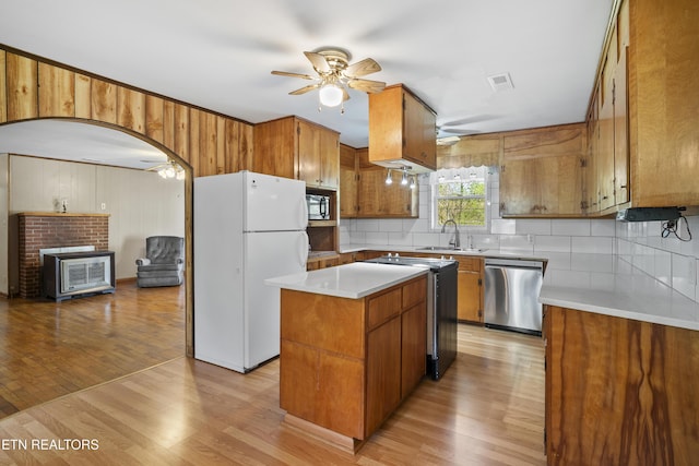 139 Hearon Rd, Kingston, TN 37763 - kitchen with dishwasher, range with electric stovetop, a sink, ceiling fan, and freestanding refrigerator
