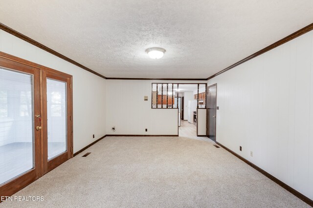 1104 Burning Tree Ln, Knoxville, TN 37923 - empty room with plenty of natural light, ornamental molding, light carpet, baseboards, and a textured ceiling