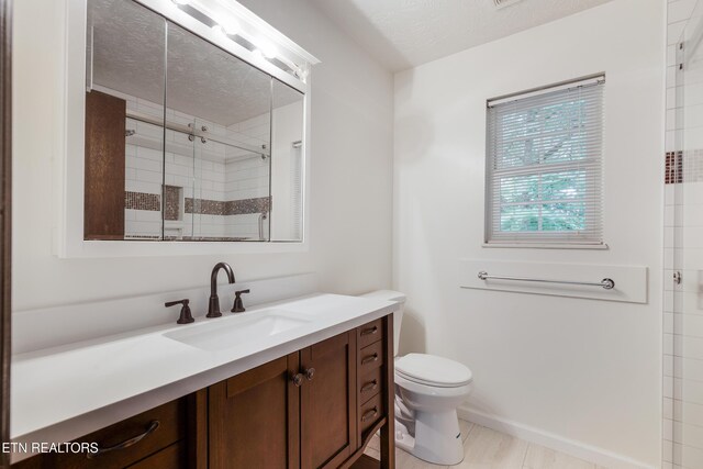 1104 Burning Tree Ln, Knoxville, TN 37923 - bathroom featuring toilet, a shower stall, and vanity