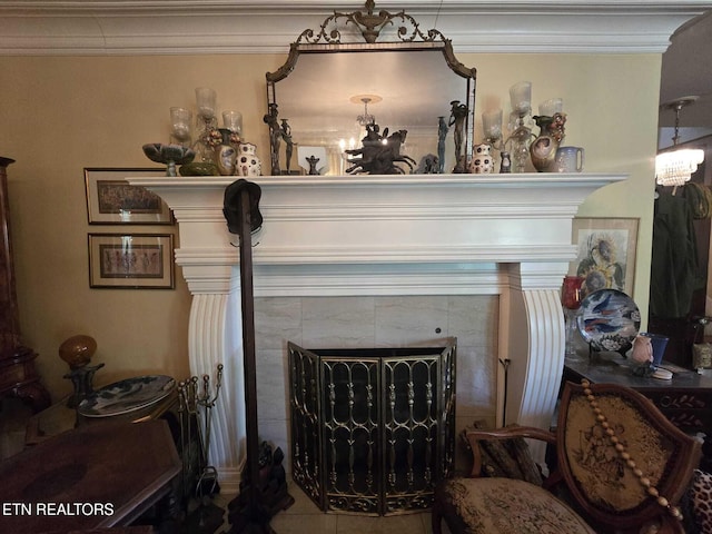 1000 Biddle St, Knoxville, TN 37914 - room details featuring a chandelier, a tile fireplace, and ornamental molding