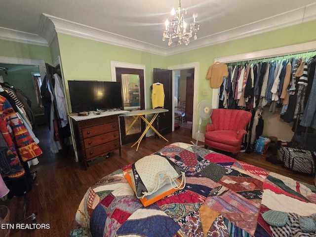 1000 Biddle St, Knoxville, TN 37914 - bedroom featuring wood finished floors, a chandelier, a closet, and crown molding