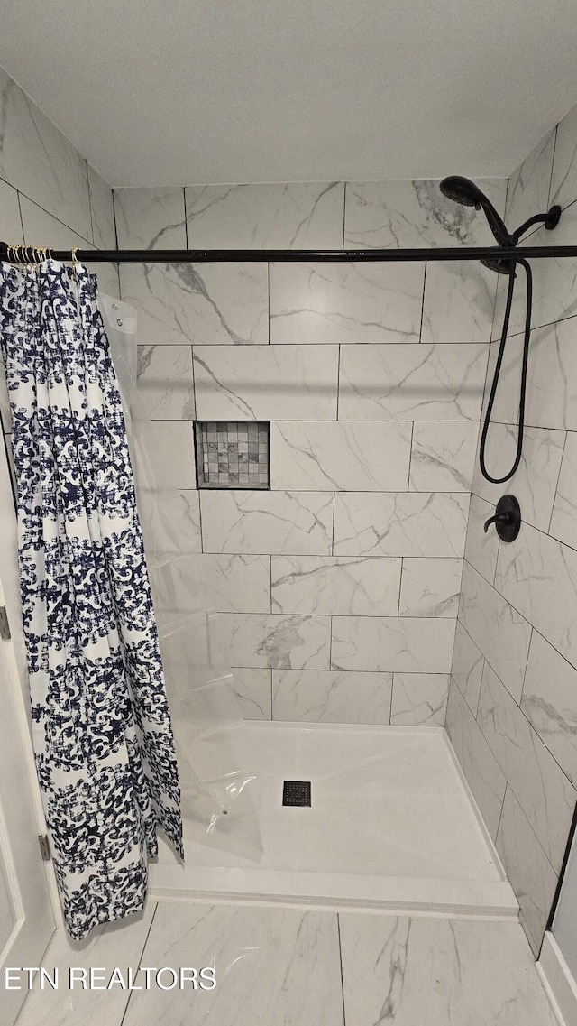 101 Old Vasper Rd, Caryville, TN 37714 - full bath featuring a tile shower and marble finish floor