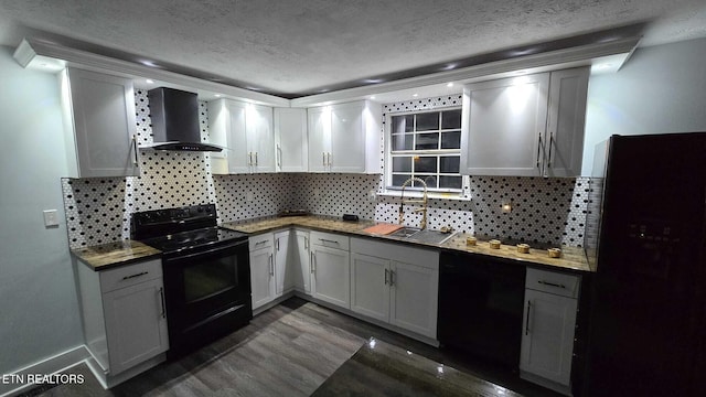 101 Old Vasper Rd, Caryville, TN 37714 - kitchen featuring dark wood finished floors, a textured ceiling, wall chimney range hood, black appliances, and a sink