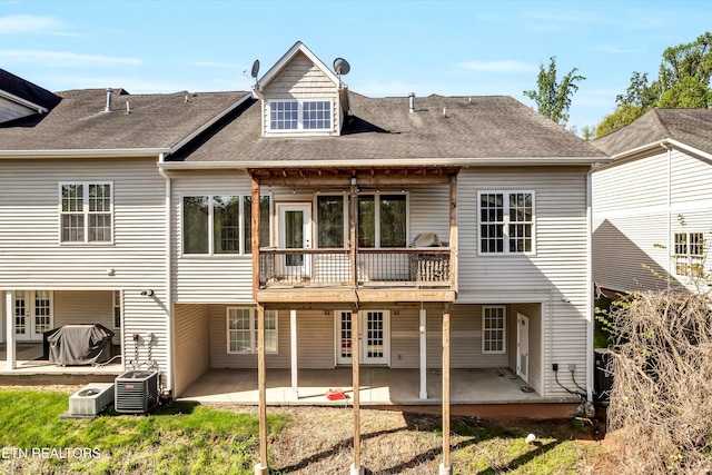 10033 Autumn Valley Ln, Knoxville, TN 37922 - back of property featuring french doors, a shingled roof, cooling unit, and a patio