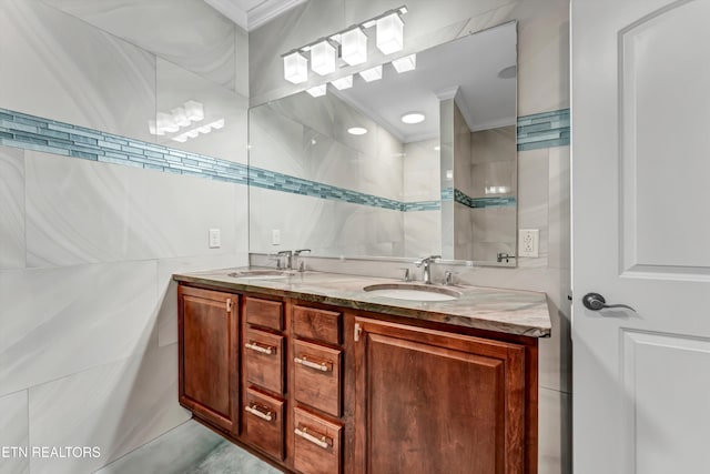 10033 Autumn Valley Ln, Knoxville, TN 37922 - full bathroom with double vanity, a sink, ornamental molding, and tile walls