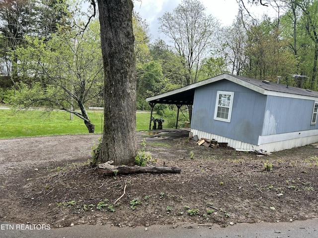 view of home's exterior featuring a lawn