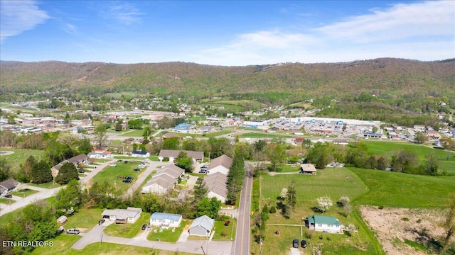 drone / aerial view featuring a mountain view and a residential view
