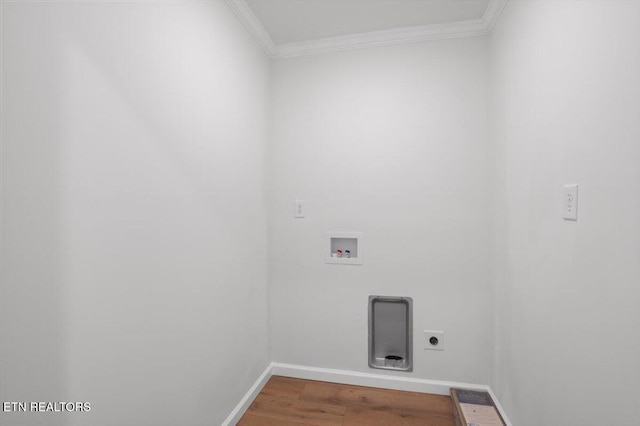 laundry area with baseboards, ornamental molding, washer hookup, laundry area, and wood finished floors