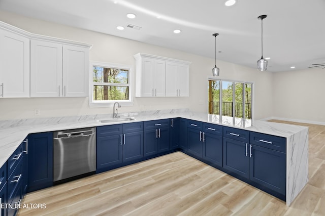 322 Fairway Dr, Dandridge, TN 37725 - kitchen with a peninsula, blue cabinetry, visible vents, dishwasher, and a sink