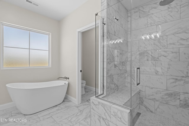 322 Fairway Dr, Dandridge, TN 37725 - full bathroom with toilet, a freestanding bath, marble finish floor, and visible vents
